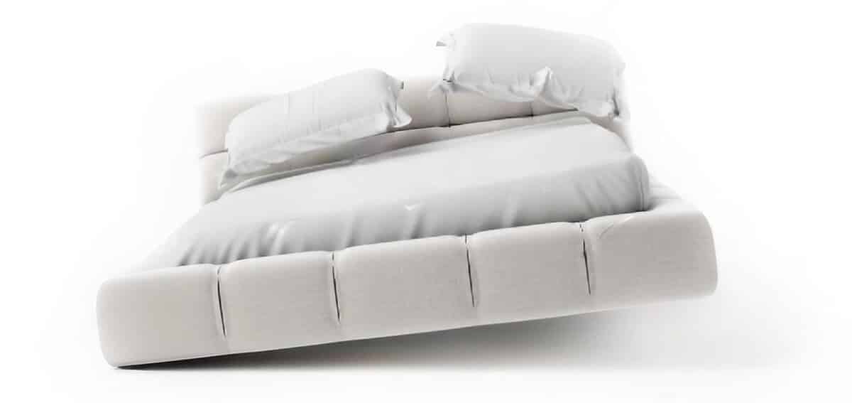 cama blanca sobre fondo blanco